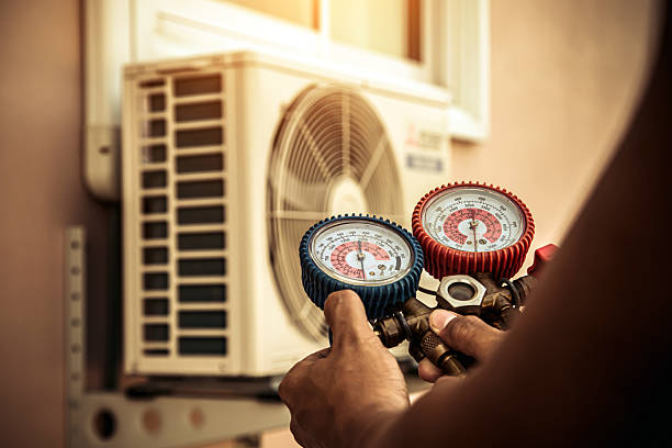 Professional Heat Pump Repair technician working in Glenwood, IA